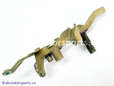 Used Yamaha ATV GRIZZLY 660 OEM part # 5KM-27263-00-00 foot brake bracket for sale