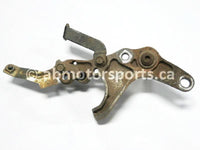 Used Yamaha ATV GRIZZLY 660 SE OEM part # 5KM-27263-00-00 rear brake mount bracket for sale