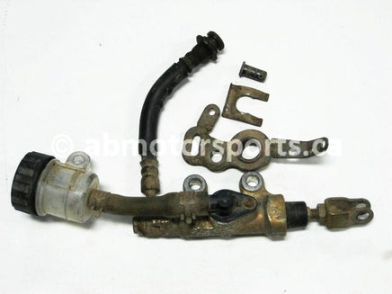 Used Yamaha ATV GRIZZLY 660 SE OEM part # 5KM-2583V-00-00 rear master cylinder for sale