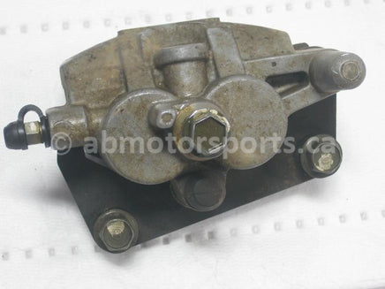 Used Yamaha ATV YFZ 450 SE OEM part # 5TG-2580T-00-00 front left brake caliper for sale