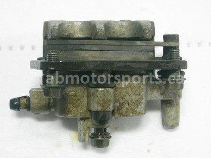 Used Yamaha ATV YFZ 450 SE OEM part # 5TG-2580U-00-00 front right brake caliper for sale
