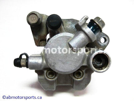 Used Yamaha ATV GRIZZLY 660 OEM part # 4WV-2580U-00-00 right front caliper for sale