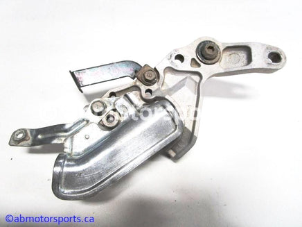 Used Yamaha ATV GRIZZLY 660 OEM part # 5KM-27263-00-00 rear brake mount for sale