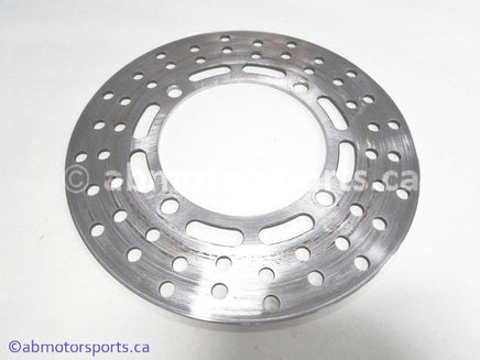 Used Yamaha ATV GRIZZLY 660 OEM part # 5KM-2582T-00-00 front brake disc for sale