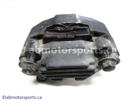 Used Yamaha ATV GRIZZLY 660 OEM part # 5KM-2580V-00-00 rear brake caliper for sale