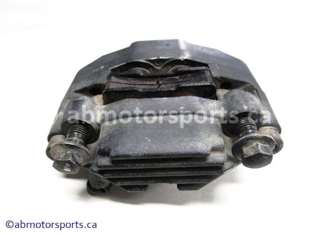 Used Yamaha ATV GRIZZLY 660 OEM part # 5KM-2580V-00-00 rear brake caliper for sale