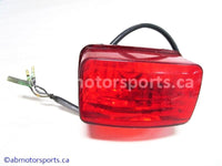Used Yamaha ATV GRIZZLY 660 OEM part # 5KM-84710-00-00 tail light for sale