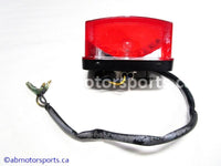 Used Yamaha ATV GRIZZLY 660 OEM part # 5KM-84710-00-00 tail light for sale