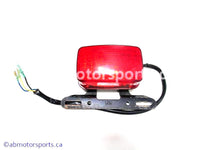 Used Yamaha ATV KODIAK 400 OEM part # 5KM-84710-00-00 tail light for sale
