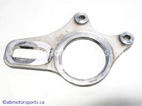 Used Yamaha ATV YFZ450 OEM part # 5TG-25721-20-00 caliper bracket for sale