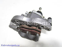 Used Yamaha ATV YFZ450 OEM part # 5TG-2580W-20-00 rear brake caliper for sale