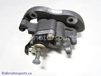 Used Yamaha ATV YFZ450 OEM part # 5TG-2580W-20-00 rear brake caliper for sale