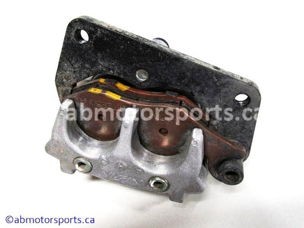 Used Yamaha ATV YFZ450 OEM part # 5TG-2580T-10-00 front left brake caliper for sale