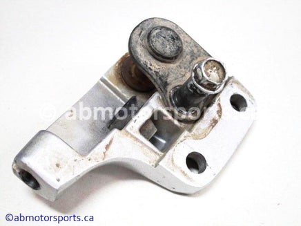 Used Yamaha ATV YFZ450 OEM part # 5TG-25727-00-00 park brake bracket for sale