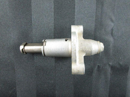 A used Cam Chain Tensioner from a 2005 GRIZZLY 660 Yamaha OEM Part # 5KM-12210-00-00 for sale. Yamaha ATV parts… Shop our online catalog… Alberta Canada!
