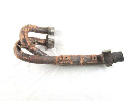 A used Exhaust Pipe from a 2005 GRIZZLY 660 Yamaha OEM Part # 5KM-14611-10-00 for sale. Yamaha ATV parts… Shop our online catalog… Alberta Canada!