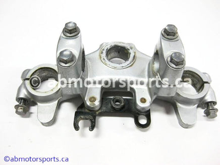 Used Yamaha Dirt Bike TTR 125 OEM part # 5HP-23435-00-00 triple tree steering clamp for sale