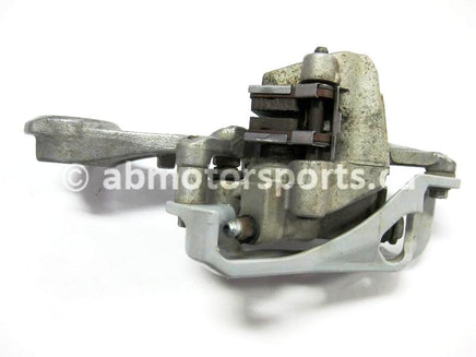 Used Yamaha Dirt Bike YZ250F OEM part # 1C3-2580W-50-00 OR 1C3-2580W-51-00 OR 1C3-2580W-52-00 rear brake caliper for sale