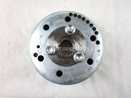 A used Flywheel from a 2009 M8 SNO PRO Arctic Cat OEM Part # 3007-315 for sale. Arctic Cat snowmobile used parts online in Canada!