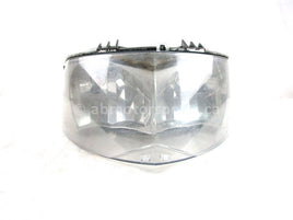 A used Headlight from a 2012 M8 SNO PRO Arctic Cat OEM Part # 0609-899 for sale. Arctic Cat snowmobile used parts online in Canada!