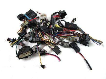 A used Main Harness Connectors from a 2012 M8 SNO PRO Arctic Cat OEM Part # 1686-588 for sale. Arctic Cat snowmobile used parts online in Canada!