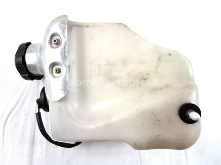 A used Oil Tank from a 2007 M1000 Arctic Cat OEM Part # 1670-604 for sale. Arctic Cat snowmobile used parts online in Canada!