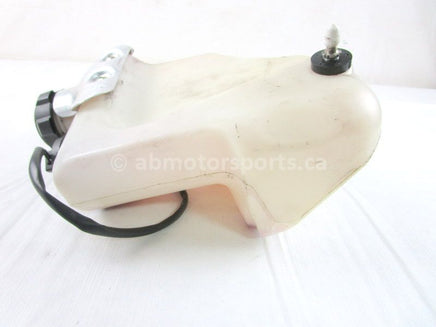 A used Oil Tank from a 2007 M1000 Arctic Cat OEM Part # 1670-604 for sale. Arctic Cat snowmobile used parts online in Canada!