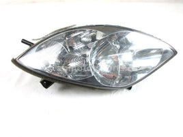 A used Headlight L from a 2007 M1000 Arctic Cat OEM Part # 0609-695 for sale. Arctic Cat snowmobile used parts online in Canada!