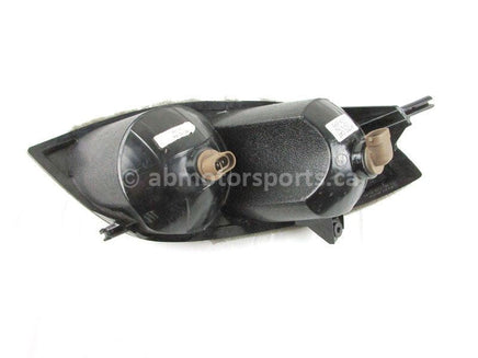 A used Headlight L from a 2007 M1000 Arctic Cat OEM Part # 0609-695 for sale. Arctic Cat snowmobile used parts online in Canada!