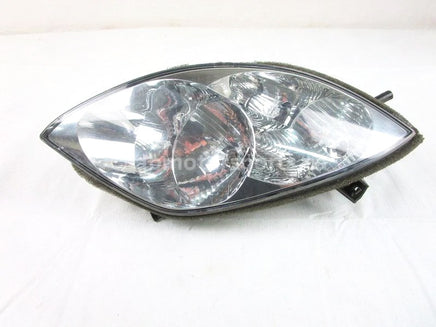 A used Headlight Right from a 2007 M1000 Arctic Cat OEM Part # 0609-694 for sale. Arctic Cat snowmobile used parts online in Canada!