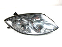 A used Headlight Right from a 2007 M1000 Arctic Cat OEM Part # 0609-694 for sale. Arctic Cat snowmobile used parts online in Canada!