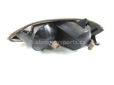 A used Headlight Right from a 2007 M1000 Arctic Cat OEM Part # 0609-694 for sale. Arctic Cat snowmobile used parts online in Canada!