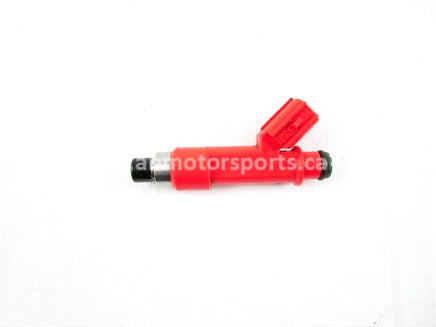 A used Fuel Injector from a 2007 M1000 Arctic Cat OEM Part # 3007-289 for sale. Arctic Cat snowmobile used parts online in Canada!