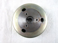 A used Flywheel from a 1991 LYNX DELUXE 340 Arctic Cat OEM Part # 3003-012 for sale. Shop online here for your used Arctic Cat snowmobile parts in Canada!