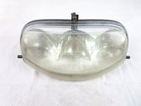 A used Head Light from a 2002 ZL 550 Arctic Cat OEM Part # 0609-250 for sale. Arctic Cat snowmobile parts? Our online catalog has parts to fit your unit!