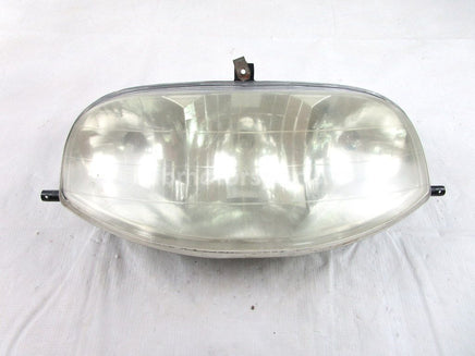 A used Head Light from a 2002 ZL 550 Arctic Cat OEM Part # 0609-250 for sale. Arctic Cat snowmobile parts? Our online catalog has parts to fit your unit!