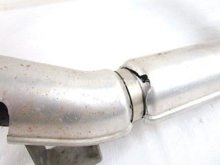 A used Exhaust Pipe from a 2004 T660 TURBO TOURING Arctic Cat OEM Part # 1712-048 for sale. Arctic Cat snowmobile parts? Our online catalog has parts to fit your unit!