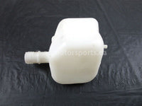 A used Coolant Reservoir from a 2015 COMMANDER 800R EFI Can Am OEM Part # 709200504 for sale. Looking for Can Am UTV parts near Edmonton? We ship daily across Canada!