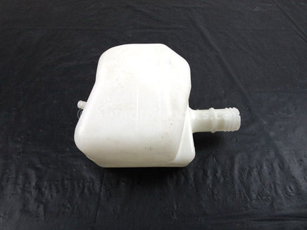 A used Coolant Reservoir from a 2015 COMMANDER 800R EFI Can Am OEM Part # 709200504 for sale. Looking for Can Am UTV parts near Edmonton? We ship daily across Canada!