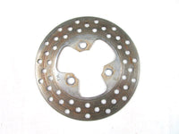 A used Front Brake Disc from a 2001 TRX400EX Honda OEM Part # 45251-HN1-003 for sale. Our online catalog has more parts!