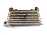 A used Oil Cooler from a 2005 TRX400FA Honda OEM Part # 15600-HN7-003 for sale. Honda ATV parts… Shop our online catalog… Alberta Canada!