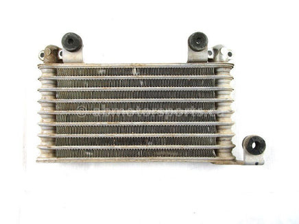 A used Oil Cooler from a 2005 TRX400FA Honda OEM Part # 15600-HN7-003 for sale. Honda ATV parts… Shop our online catalog… Alberta Canada!