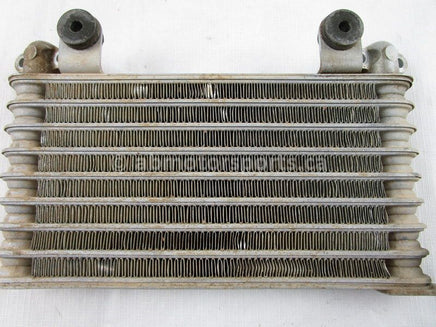 A used Oil Cooler from a 2005 TRX400FA Honda OEM Part # 15600-HN7-003 for sale. Honda ATV parts… Shop our online catalog… Alberta Canada!