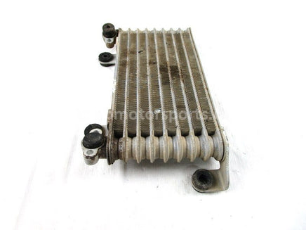 A used Oil Cooler from a 2005 TRX400FA Honda OEM Part # 15600-HN7-003 for sale. Honda ATV parts… Shop our online catalog… Alberta Canada!