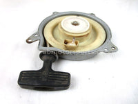A used Recoil from a 2004 TRX 450FM Honda OEM Part # 28400-HM7-A51 for sale. Honda ATV parts… Shop our online catalog… Alberta Canada!