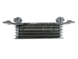 A used Oil Cooler from a 2005 TRX 350FM Honda OEM Part # 15600-HM7-610 for sale. Honda ATV parts… Shop our online catalog… Alberta Canada!