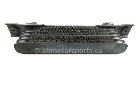 A used Oil Cooler from a 2005 TRX 350FM Honda OEM Part # 15600-HM7-610 for sale. Honda ATV parts… Shop our online catalog… Alberta Canada!