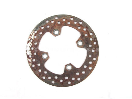 A used Brake Disc F from a 2002 PRAIRIE 650 Kawasaki OEM Part # 41080-1513 for sale. Kawasaki ATV? Check out our online catalog for parts that fit your unit.