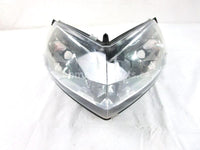 A used Headlight from a 2012 RMK PRO 800 Polaris OEM Part # 2411017 for sale. Check out Polaris snowmobile parts in our online catalog!