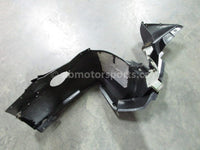 A used Belly Pan Right from a 2005 FUSION 900 Polaris OEM Part # 2633000-070 for sale. Online Polaris snowmobile parts in Alberta, shipping daily across Canada!
